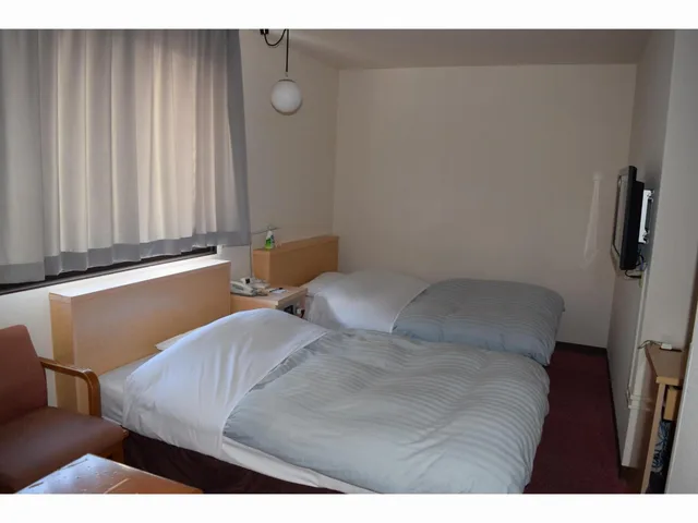 غرفة قياسية بسريرين منفصلين للمدخنين، Amami Port Tower Hotel 1/5