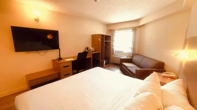 غرفة بسرير كينج، Econo Lodge Airport Ste Foy 2/6