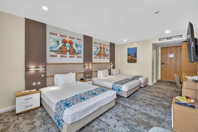 Superior, Triple, 1 Single and 2 Queen Beds، PrideInn Azure Hotel Nairobi Westlands 2/7
