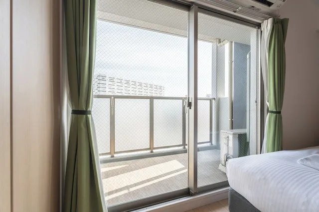 غرفة عائلية بثلاثة أسرّة مع أريكة في طابق مرتفع، Eslead Hotel Namba South I 6/10