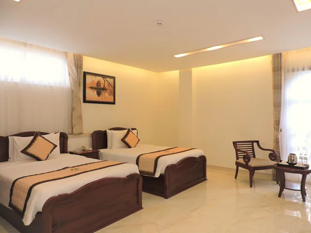 غرفة عائلية ثلاثية بسريرين كينج بإطلالة على المدينة بغرفة نوم واحدة، Minh Tam Phu Nhuan Hotel and Spa 1/4