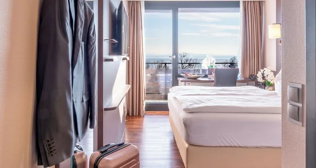 غرفة قياسية بسرير كوين بإطلالة على البحر، PLAZA Hotel Fohr am Bodensee 5/9