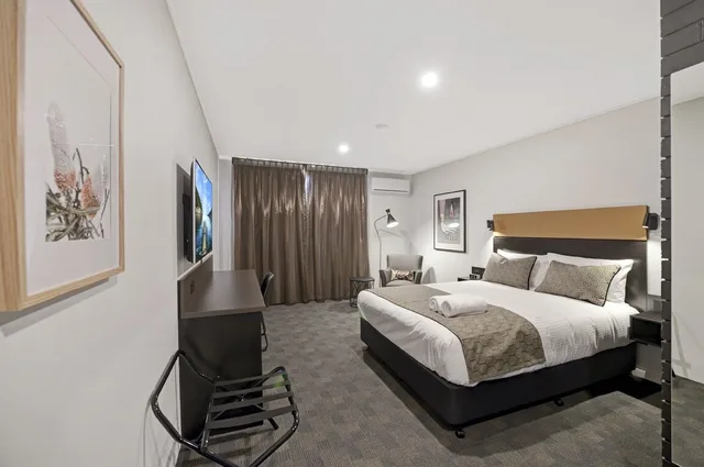 غرفة تنفيذية بسرير كوين، Cbd Motor Inn 1/8