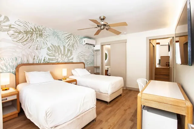 جناح جونيور بسرير مزدوج بإطلالة على الحديقة، Hotel Cocoplum Beach 3/5