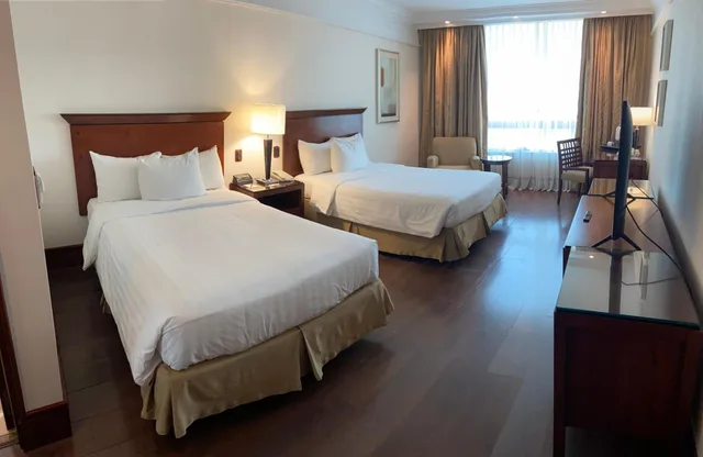 غرفة ديلوكس بسريرين كوين، Regal Pacific 3/7
