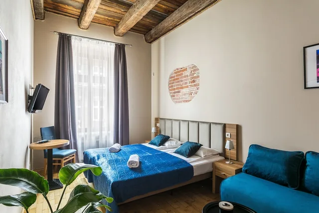 غرفة ديلوكس رباعية بسريرين منفصلين مع أريكة، Aparthotel Pergamin 3/7
