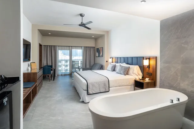 جناح جونيور بسريرين مزدوجين بإطلالة جزئية على البحر، RIU Palace Kukulkan - Adults Only - All Inclusive 3/3