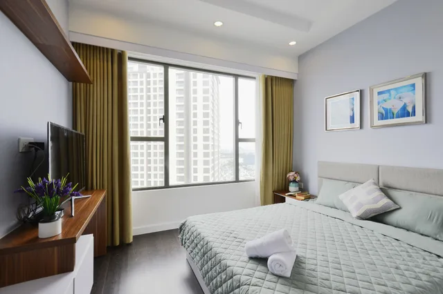 شقة بسرير كوين وسريرين كينج بـ3 غرف نوم، Spacious Saigon 2/10