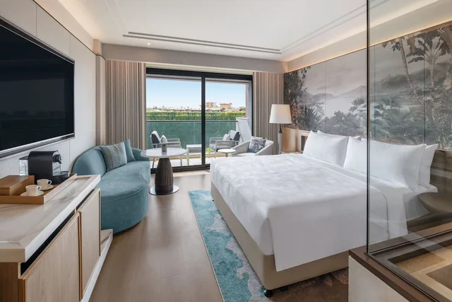 غرفة فاخرة بسريرين منفصلين بإطلالة على الفناء بشرفة، JW Marriott Goa Vagator 2/10
