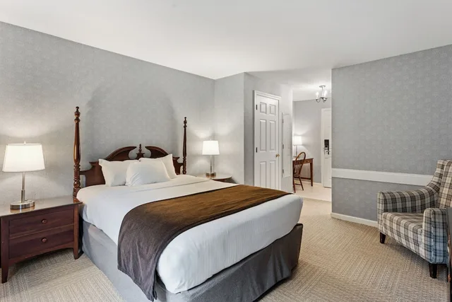 جناح بريميير بسرير كينج وسرير كوين بغرفتي نوم مع أريكة، The Essex Vermont S Culinary Resort Spa 2/4