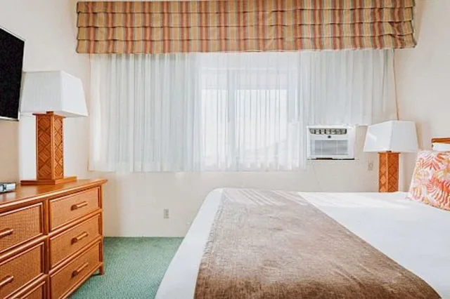 شقة سكنية بسرير كوين وسرير مزدوج بغرفتي نوم مع أريكة بمطبخ، Banyan Harbor Resort 7/10