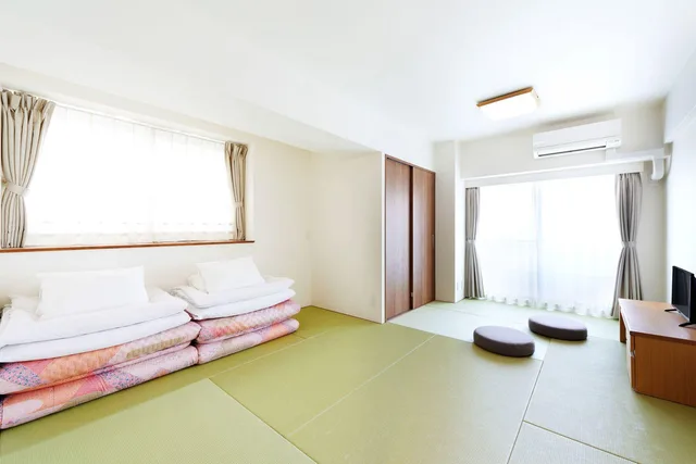 غرفة يابانية بفرشتي فوتون، Montan Hakata Hostel 2/2