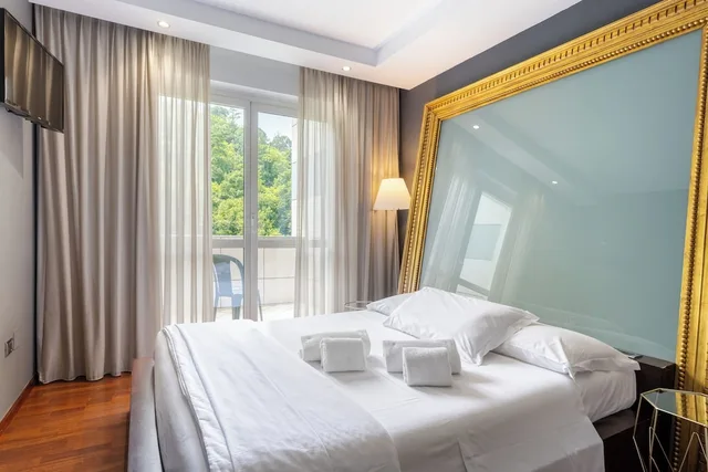 غرفة رباعية بسريرين منفصلين، Aston Hotel 2/4