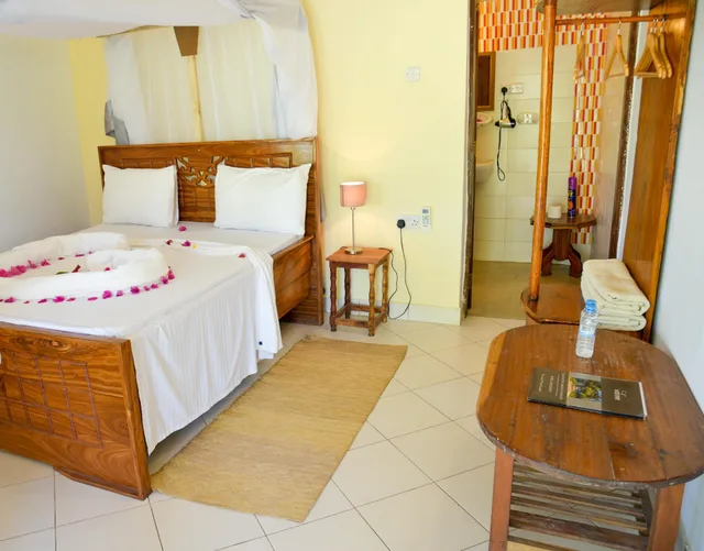غرفة ديلوكس بسرير مزدوج، Tanzanite Beach Resort 1/1