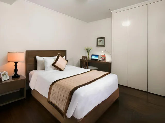غرفة ديلوكس بسرير كينج وسرير كوين بغرفتي نوم، CALIDAS Landmark72 Royal Residence HANOI A 3/3
