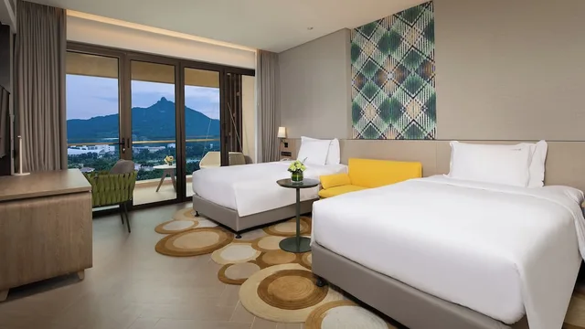 غرفة بريميوم بسريرين منفصلين، Holiday Inn Resort Qionghai Guantang 1/10