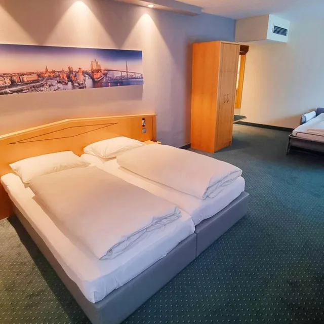 غرفة بسرير كينج مع سرير إضافي، Hotel Panorama Hamburg-Harburg 6/10