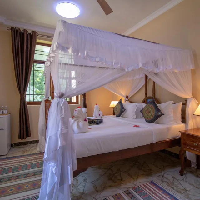غرفة سوبيريور بسرير كينج، Sunny Palms Beach Bungalows 2/10
