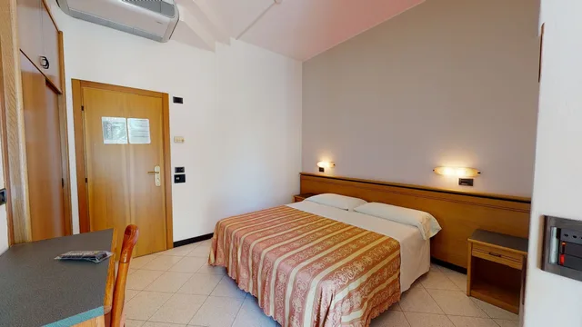 غرفة عائلية رباعية بسريرين كوين بشرفة بغرفتي نوم، Hotel Excelsior 1/5