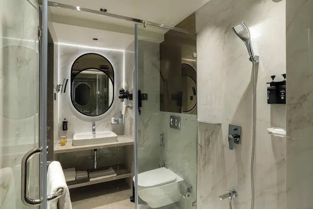 غرفة سيغنتشر بسرير كينج، Grand Residency Service Apartment 3/4
