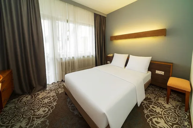 غرفة كومفورت بسريرين منفصلين بشرفة، Hotel Munsch 3/9