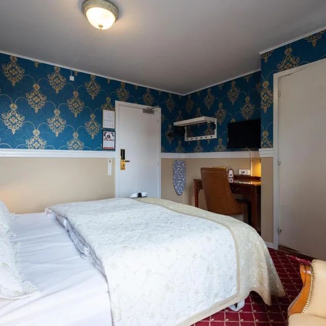 غرفة بسرير مزدوج أو سريرين منفصلين، Milling Hotel Plaza 1/10