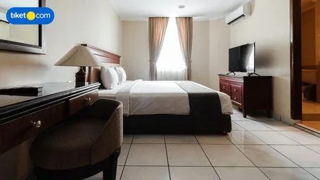 جناح ديلوكس بسرير كينج وثلاثة أسرّة بـ3 غرف نوم، Travellers Suites Serviced Apartments 4/5