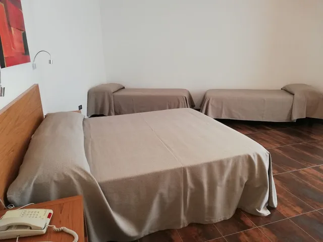 غرفة رباعية بسرير مزدوج وسريرين منفصلين، Sciali Hotel 3/10