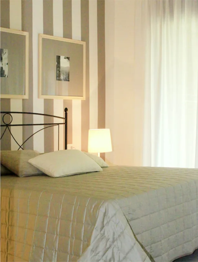 غرفة بسرير مزدوج مع أريكة، Chianti Village Morrocco 1/4