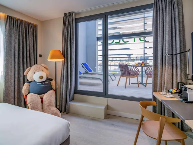 غرفة سوبيريور بسريرين منفصلين وسرير كينج، Novotel Madrid City Las Ventas 1/7