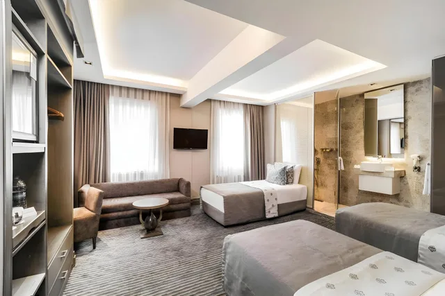 غرفة عائلية بسرير كوين وسريرين فرديين، AHC Grand Bazaar Hotel 1/1