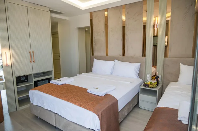 جناح ديلوكس بثلاثة أسرّة وسرير كوين، Cetin Port Hotel 1/1