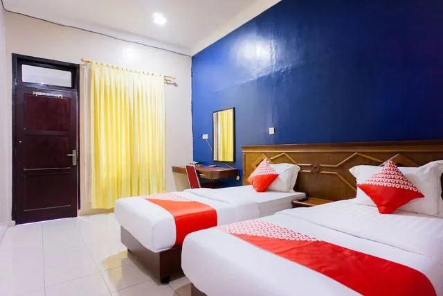 غرفة ديلوكس بسريرين منفصلين، OYO 1636 Wisma Kuta Karang 2/7