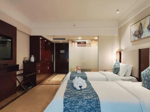 غرفة بسريرين منفصلين بإطلالة على البحر، Wyndham Garden Wenchang Nanguo 5/6
