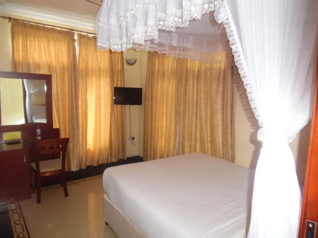 غرفة قياسية بسرير كوين، Lantana Hotel 1/2