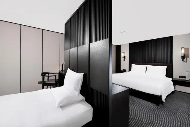 جناح عائلي ديلوكس بسرير كينج مع أريكة، Xi'an Eastern House Boutique Hotel 2/10