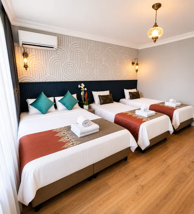غرفة عائلية رباعية بسرير كينج وسريرين منفصلين، De Maree Hotel 2/2