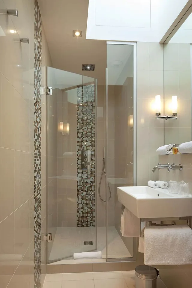 غرفة ديلوكس ثلاثية بسرير مزدوج مع أريكة، Hotel Le Petit Paris 3/5