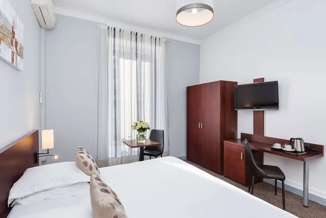غرفة ديلوكس كبيرة بسرير كينج، Best Western Plus Hotel Brice Garden 3/9