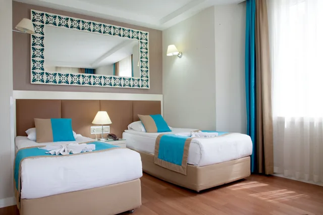 غرفة بسرير مزدوج أو سريرين منفصلين، Nasa Flora Hotel 1/6