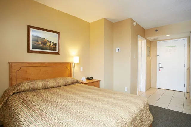 غرفة قياسية بسرير كوين، Les Suites Labelle 1/10