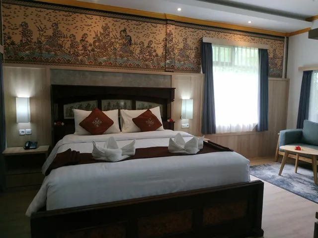غرفة بسرير مزدوج أو سريرين منفصلين بإطلالة على المسبح، Melasti Beach Bungalows And Spa 1/10