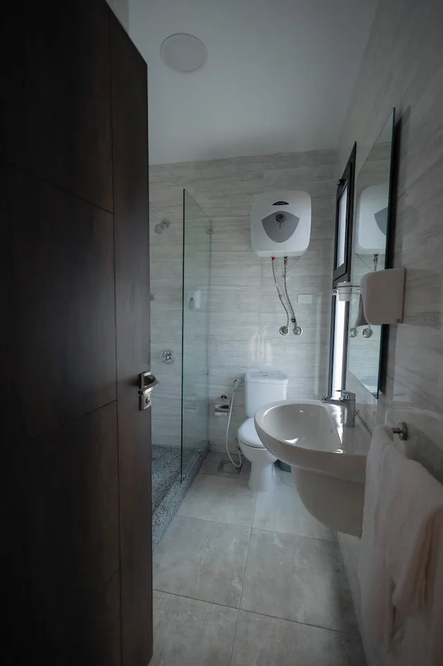 استوديو ديلوكس بسريرين منفصلين مع أريكة، Royal Inn Residence New Cairo 8/9