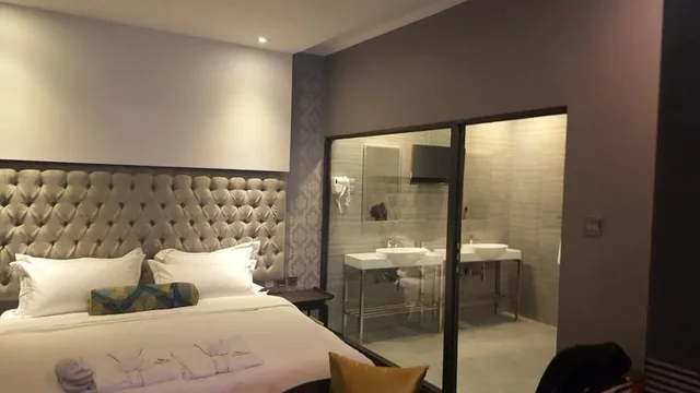 جناح تنفيذي بسرير كوين، Staywell Hotels 1/1