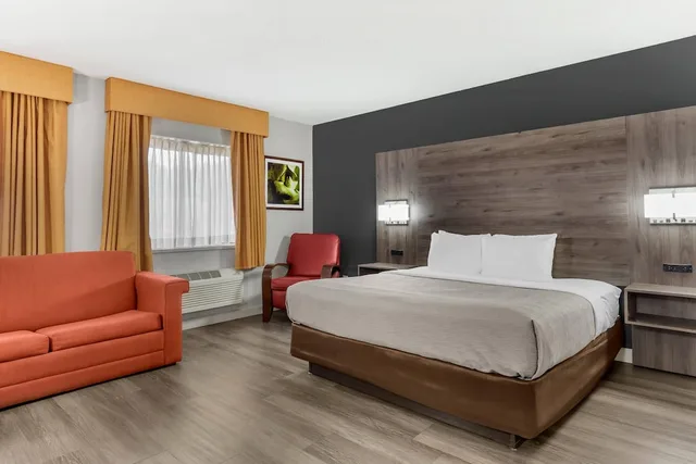 Room, King Bed, Sofa, Quality Inn & Suites Raleigh Durham Airport 2/9