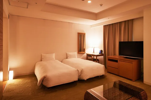 غرفة بريميوم رباعية بسريرين منفصلين، Pacific Hotel Okinawa 2/3