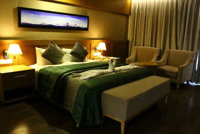 جناح فاخر بسرير كينج بإطلالة على الحديقة، Vgp Golden Beach Resort 1/2