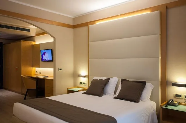 غرفة ديلوكس رباعية، Park Hotel Ai Pini 1/3