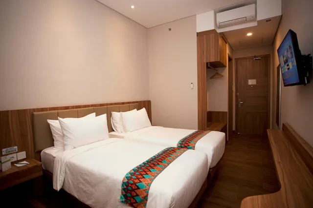 غرفة ديلوكس بسريرين منفصلين، W Three Style Hotel Makassar 1/1