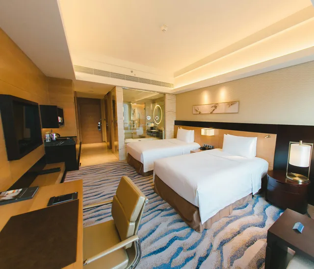 غرفة ديلوكس بسريرين منفصلين بإطلالة على البحر، Hilton Yantai Golden Coast 2/5